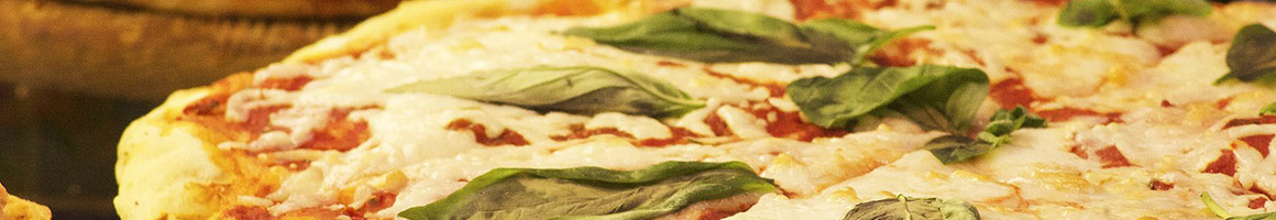 Eating Italian Pizza at La Famiglia Pizzeria restaurant in Rochester, NY.